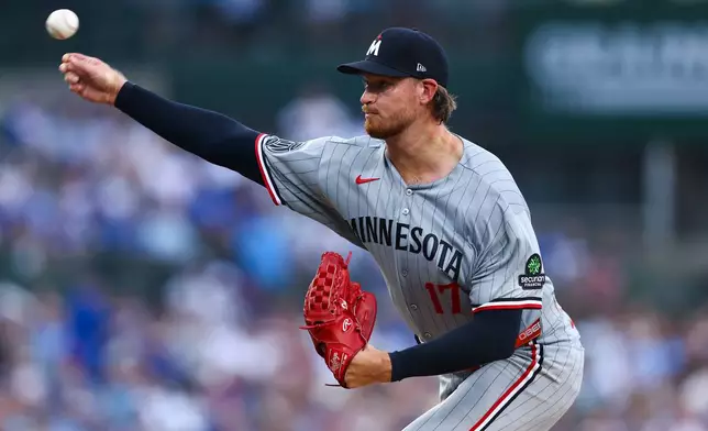 Minnesota Twins pitcher Bailey Ober delivers to a Chicago Cubs batter during the first inning of a baseball game in Chicago, Friday, July 17, 2026. (AP Photo/Jessie Alcheh)