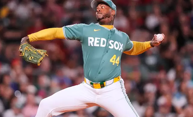 Boston Red Sox's Aroldis Chapman delivers during the ninth inning of a baseball game against the Toronto Blue Jays, Friday, July 24, 2026, in Boston. (AP Photo/Charles Krupa)