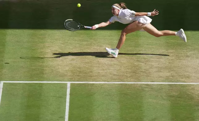 Karolina Muchova of Czech Republic stretches to play a return to Linda Noskova of Czech Republic women's singles final at Wimbledon Tennis Championships in London, Saturday, July 11, 2026. (AP Photo/Brian Inganga)