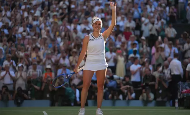Linda Noskova of Czech Republic celebrates winning against Karolina Muchova of Czech Republic in the women's singles final at Wimbledon Tennis Championships in London, Saturday, July 11, 2026. (AP Photo/Kirsty Wigglesworth)