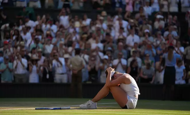 Linda Noskova of Czech Republic reacts to winning against Karolina Muchova of Czech Republic in the women's singles final at Wimbledon Tennis Championships in London, Saturday, July 11, 2026. (AP Photo/Kirsty Wigglesworth)