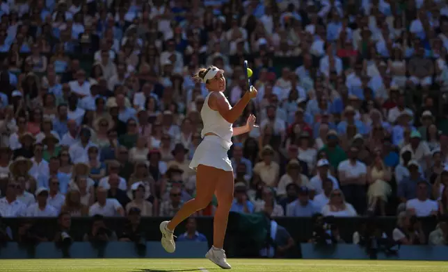 Linda Noskova of Czech Republic returns the ball to Karolina Muchova of Czech Republic in the women's singles final at Wimbledon Tennis Championships in London, Saturday, July 11, 2026. (AP Photo/Kirsty Wigglesworth)