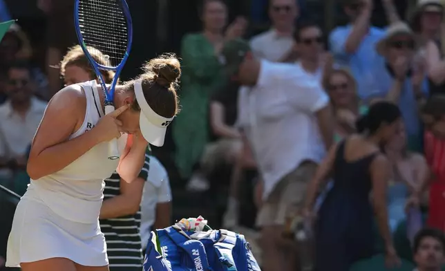 Linda Noskova of Czech Republic reacts as she returns to her chair during a changeover after losing 4 championship points against Karolina Muchova of Czech Republic in the women's singles final at Wimbledon Tennis Championships in London, Saturday, July 11, 2026. (AP Photo/Kirsty Wigglesworth)