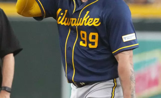 Milwaukee Brewers' Gary Sánchez reacts after hitting a double against the Arizona Diamondbacks in the seventh inning of a baseball game, Sunday, July 5, 2026, in Phoenix. (AP Photo/Rick Scuteri)