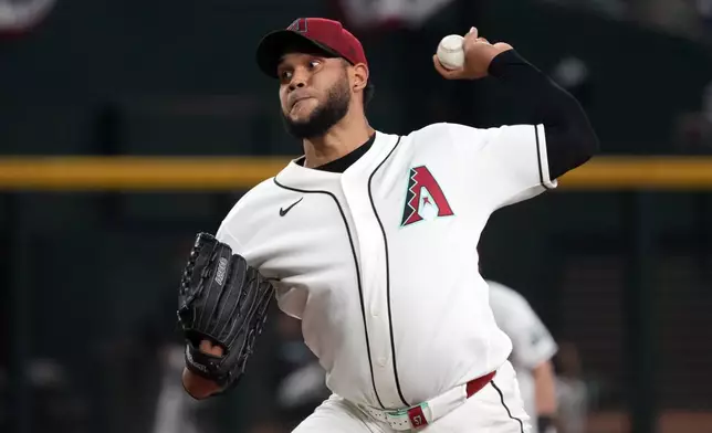 Arizona Diamondbacks pitcher Eduardo Rodriguez throws against the Milwaukee Brewers in the first inning of a baseball game, Sunday, July 5, 2026, in Phoenix. (AP Photo/Rick Scuteri)
