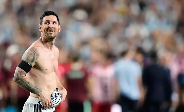 Argentina's Lionel Messi reacts after his team's victory over Switzerland in the World Cup quarterfinal soccer match in Kansas City, Mo., Saturday, July 11, 2026. (AP Photo/Charlie Riedel)