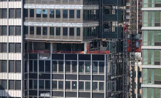 A buckled support beam is seen inside 235 East 42nd Street, Wednesday, July 8, 2026, in New York. (AP Photo/Yuki Iwamura)
