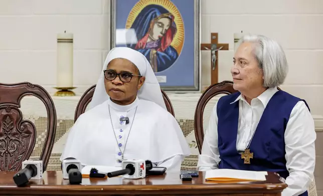 Sister Leticia "Letty" Ugboaja, left, accompanied by Executive Director of Catholic Charities of the Rio Grande Valley Sister Norma Pimentel at a news conference at Our Lady of Sorrows Catholic Church on Thursday, July 23, 2026, in McAllen, Texas. (AP Photo/Michael Gonzalez)