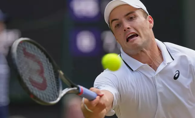 Arthur Fery of Britain plays a run to Alexander Zverev of Germany during their men's singles semifinal match at the Wimbledon Tennis Championships in London, Friday, July 10, 2026. (AP Photo/Kirsty Wigglesworth)