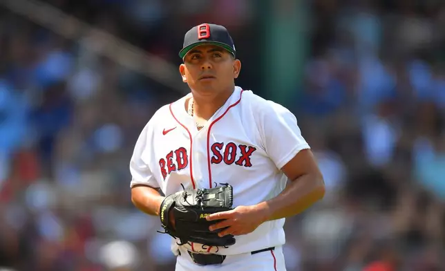 Boston Red Sox's Ranger Suarez steps off the mound after pitching in the fourth inning of a baseball game against the Toronto Blue Jays, Sunday, July 26, 2026, in Boston. (AP Photo/Steven Senne)