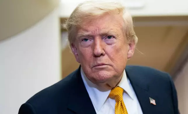 President Donald Trump speaks with reporters in flight on Air Force One after landing at U.S. Air Force Base at RAF Mildenhall, in Suffolk Eastern England, Wednesday, July 8, 2026. (AP Photo/Alex Brandon)