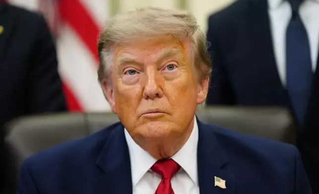 President Donald Trump speaks in the Oval Office of the White House, Monday, July 13, 2026, in Washington, before signing an executive order. (AP Photo/Julia Demaree Nikhinson)