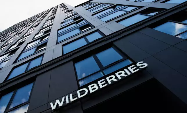 The name of an outlet of Russia's major online retailer Wildberries is seen on building in Moscow, Wednesday, July 22, 2026. (AP Photo/Alexander Zemlianichenko)