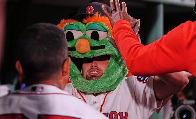 Boston Red Sox's Caleb Durbin celebrates after his home run in the eighth inning of a baseball game against the Baltimore Orioles, Monday, July 20, 2026, in Boston. (AP Photo/Charles Krupa)