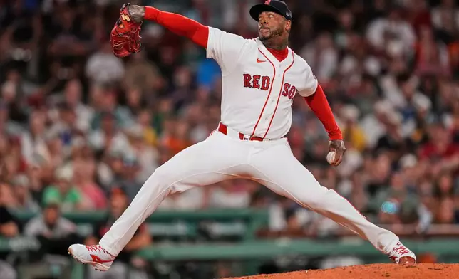 Boston Red Sox's Aroldis Chapman delivers during the ninth inning of a baseball game against the Baltimore Orioles, Monday, July 20, 2026, in Boston. (AP Photo/Charles Krupa)