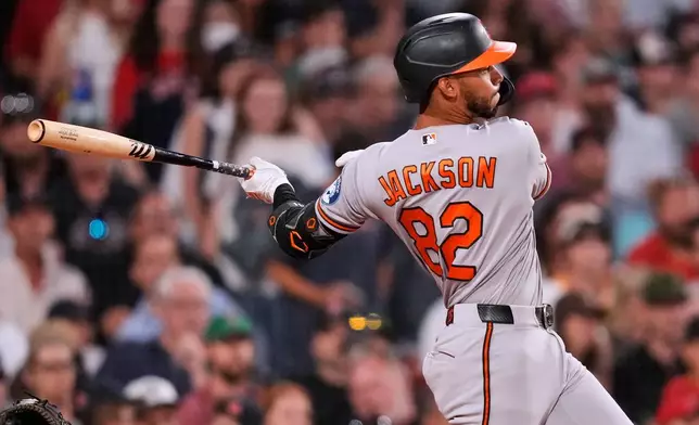 Baltimore Orioles' Jeremiah Jackson watches his RBI single in the sixth inning of a baseball game against the Boston Red Sox, Monday, July 20, 2026, in Boston. (AP Photo/Charles Krupa)