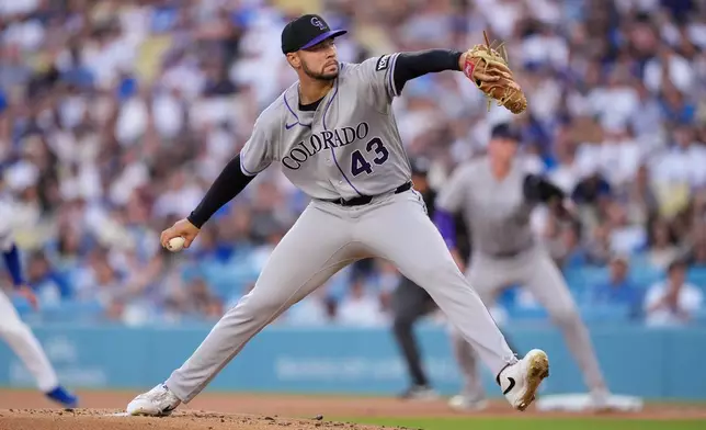Colorado Rockies starting pitcher Gabriel Hughes throws to the plate during the first inning of a baseball game against the Los Angeles Dodgers, Wednesday, July 8, 2026, in Los Angeles. (AP Photo/Mark J. Terrill)