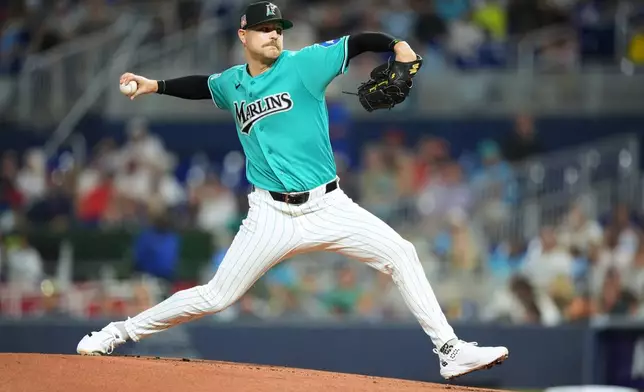 Miami Marlins starting pitcher Janson Junk delivers during the first inning of a baseball game against the San Diego Padres, Sunday, July 26, 2026, in Miami. (AP Photo/Rebecca Blackwell)