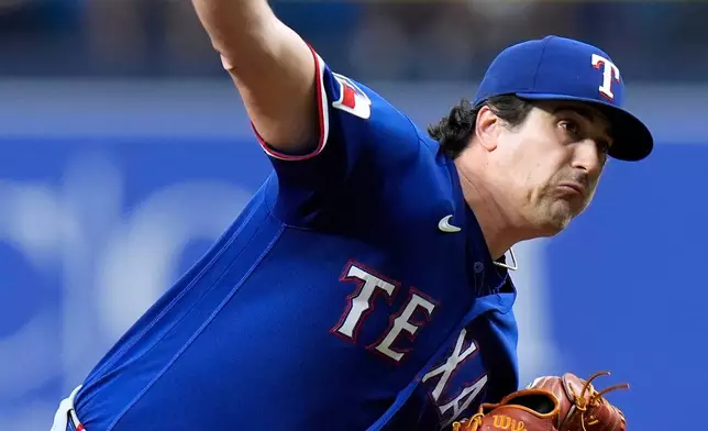 Texas Rangers' Cal Quantrill pitches to the Tampa Bay Rays during the first inning of a baseball game Tuesday, July 28, 2026, in St. Petersburg, Fla. (AP Photo/Chris O'Meara)