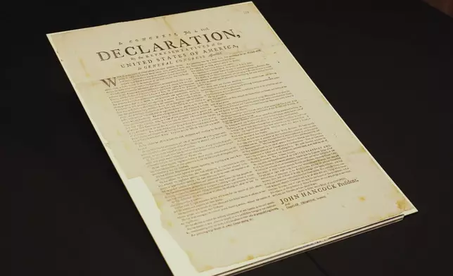 This image made from video shows a newly discovered copy of the U.S. Declaration of Independence, printed in July 1776 in Exeter, is displayed at The National Archives in London, Thursday, July 2, 2026. (AP Photo/Kwiyeon Ha)