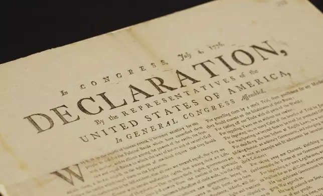 This image made from video shows a newly discovered copy of the U.S. Declaration of Independence, printed in July 1776 in Exeter, is displayed at The National Archives in London, Thursday, July 2, 2026. (AP Photo/Kwiyeon Ha)