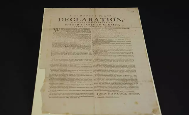 This image made from video shows a newly discovered copy of the U.S. Declaration of Independence, printed in July 1776 in Exeter, is displayed at The National Archives in London, Thursday, July 2, 2026. (AP Photo/Kwiyeon Ha)