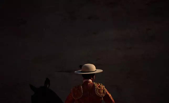 A Spanish picador performs during a bullfight at the San Fermín Festival in Pamplona, northern Spain, Wednesday, July 8, 2026. (AP Photo/Miguel Oses)