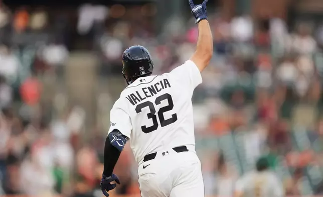 Detroit Tigers' Eduardo Valencia rounds first base after hitting a home run against the Athletics during the seventh inning of a baseball game Thursday, July 9, 2026, in Detroit. (AP Photo/Paul Sancya)