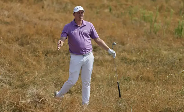Matt Fitzpatrick of England reacts after playing from the rough on the 6th hole during the second day of the British Open Golf championships at Royal Birkdale golf club, in Southport, England, Friday, July 17, 2026. (AP Photo/Peter Morrison)