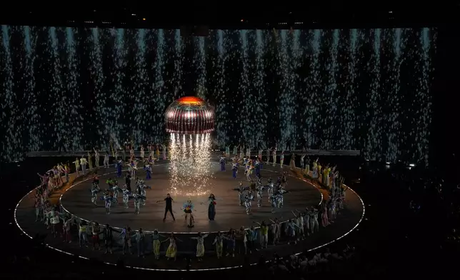 Pyrotechnics go off during the end of the Commonwealth Games opening ceremony in Glasgow, Scotland, Thursday, July 23, 2026. (AP Photo/Manish Swarup)