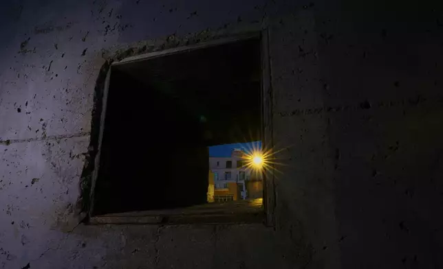 An embrasure is next to the U.N. buffer zone separating the Greek Cypriot south from the Turkish Cypriot north, established after the July 20, 1974 Turkish invasion of Cyprus, in the medieval core of the divided capital of Nicosia, Cyprus, on July 16, 2026. (AP Photo/Petros Karadjias)