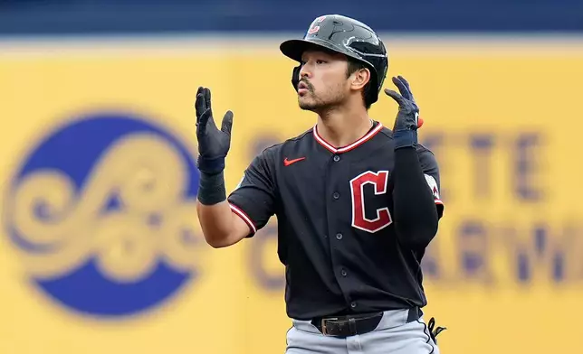 Cleveland Guardians' Steven Kwan celebrates after hitting a double off Tampa Bay Rays pitcher Drew Rasmussen during the first inning of a baseball game Sunday, July 26, 2026, in St. Petersburg, Fla. (AP Photo/Chris O'Meara)