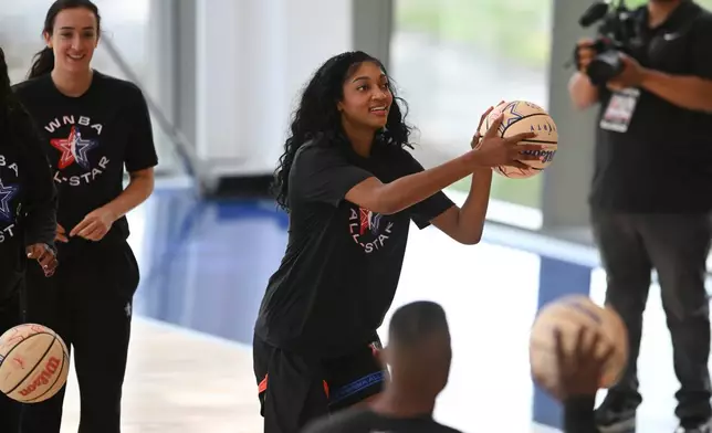 WNBA All Star Angel Reese shoots during practice at the Obama Presidential Center in Chicago, Friday, July 24, 2026. (AP Photo/Paul Beaty)