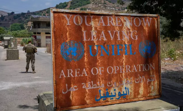 A Lebanese army soldier stands at a checkpoint in Froun village, southern Lebanon, Thursday, July 16, 2026. (AP Photo/Mohammed Zaatari)