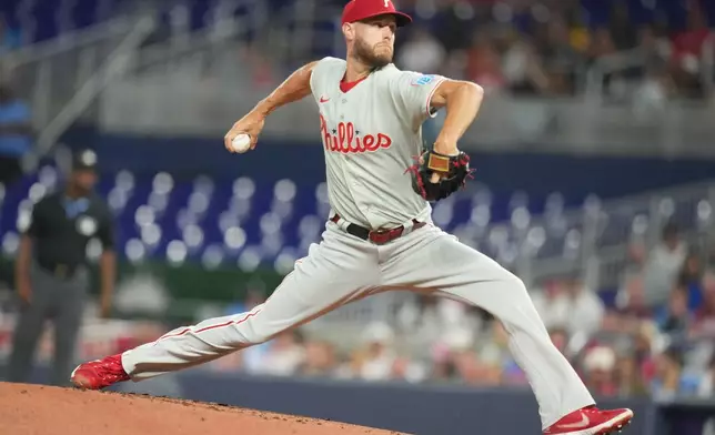 Philadelphia Phillies starting pitcher Zack Wheeler throws during the first inning of a baseball game against the Miami Marlins, Monday, July 27, 2026, in Miami. (AP Photo/Lynne Sladky)