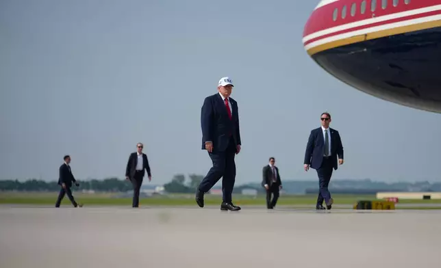 President Donald Trump walks from Marine One to board Air Force One at Bismarck Municipal Airport, Wednesday, July 1, 2026, in Bismarck, N.D. (AP Photo/Julia Demaree Nikhinson)