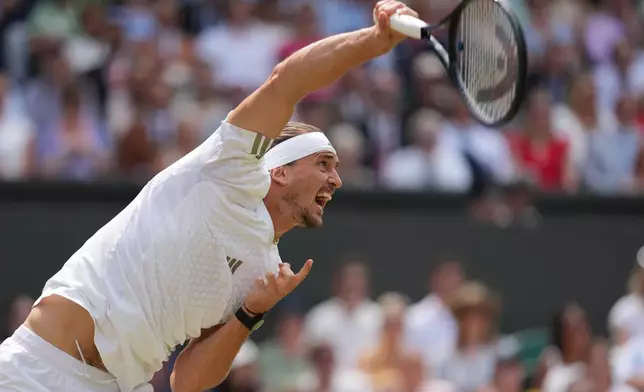 Alexander Zverev of Germany serves to Arthur Fery of Britain during their men's singles semifinal match at the Wimbledon Tennis Championships in London, Friday, July 10, 2026. (AP Photo/Kirsty Wigglesworth)