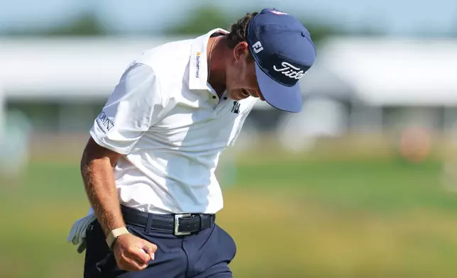 Jackson Koivun reacts after winning the 3M Open golf tournament at the Tournament Players Club Sunday, July 26, 2026, in Blaine, Minn. (AP Photo/Bailey Hillesheim)
