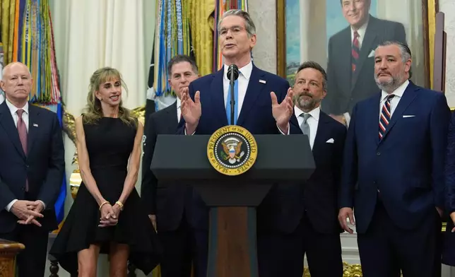 Treasury Secretary Scott Bessent speaks before President Donald Trump rings the opening bell for the New York Stock Exchange and the Nasdaq in the Oval Office at the White House, Monday, July 6, 2026, in Washington. (AP Photo/Mark Schiefelbein)