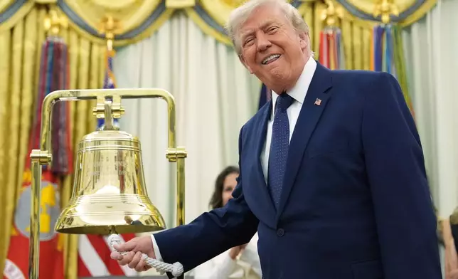 President Donald Trump rings the opening bell for the New York Stock Exchange and the Nasdaq in the Oval Office at the White House, Monday, July 6, 2026, in Washington. (AP Photo/Mark Schiefelbein)