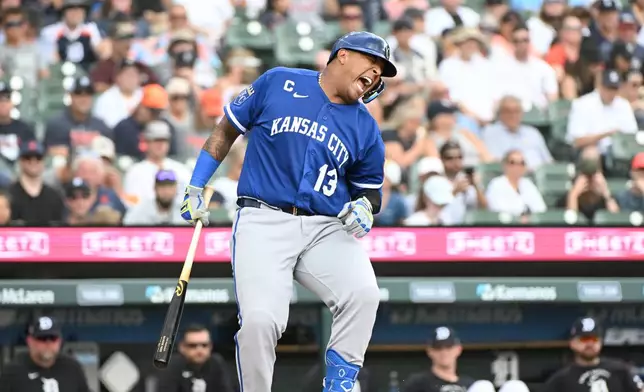 Kansas City Royals designated hitter Salvador Perez reacts after being hit by a pitch during the first inning of a baseball game against the Detroit Tigers, Sunday, July 26, 2026, in Detroit. (AP Photo/Jose Juarez)
