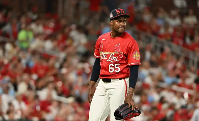 St. Louis Cardinals pitcher George Soriano looks on after giving up a 2-run home run to Cincinnati Reds' baseman Eugenio Suárez during the seventh inning of a baseball game, Friday, July 24, 2026, in St. Louis. (AP Photo/Jeff Le)