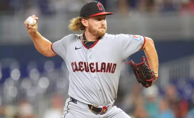 Cleveland Guardians starting pitcher Tanner Bibee throws during the first inning of a baseball game against the Miami Marlins, Saturday, July 11, 2026, in Miami. (AP Photo/Jim Rassol)