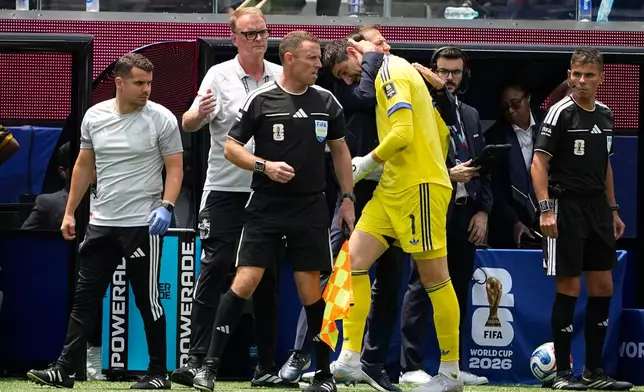 Belgium goalkeeper Thibaut Courtois (1) goes off the field during the World Cup quarterfinal soccer match between Spain and Belgium in Inglewood, Calif., near Los Angeles, Friday, July 10, 2026. (AP Photo/Lindsey Wasson)