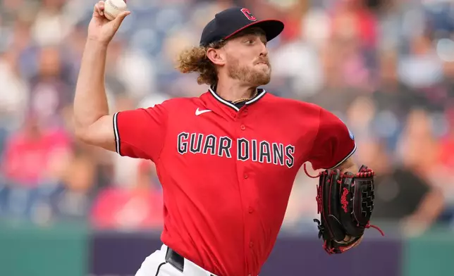 Cleveland Guardians' Tanner Bibee pitches in the first inning of a baseball game against the Minnesota Twins in Cleveland, Monday, July 20, 2026. (AP Photo/Sue Ogrocki)