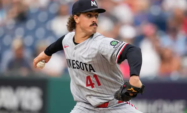 Minnesota Twins' Joe Ryan (41) pitches in the first inning of a baseball game against the Cleveland Guardians in Cleveland, Monday, July 20, 2026. (AP Photo/Sue Ogrocki)