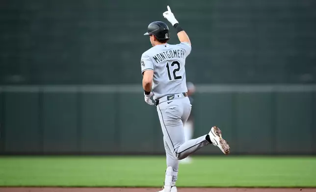 Chicago White Sox's Colson Montgomery gestures as he rounds the bases and celebrates his two-run home run during the third inning of a baseball game against the Baltimore Orioles, Tuesday, June 30, 2026, in Baltimore. (AP Photo/Nick Wass)