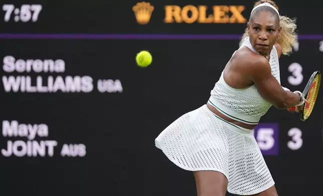 Serena Williams of the United States plays a backhand against Maya Joint of Australia in their first round women's singles match at the Wimbledon Tennis Championships in London, Tuesday, June 30, 2026. (AP Photo/Maja Smiejkowska)