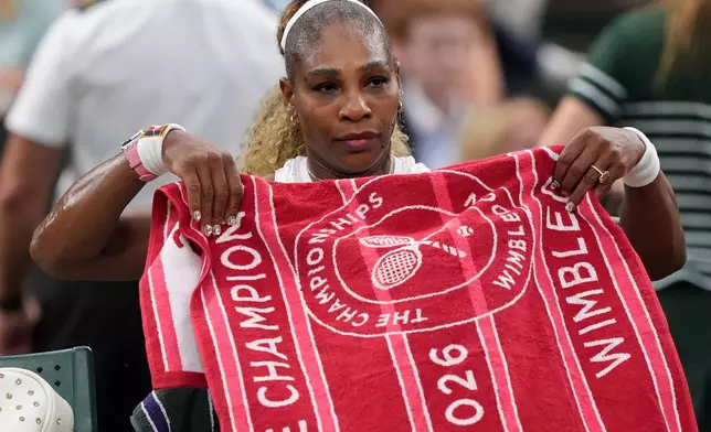 Serena Williams of the United States sits during a changeover in her first round women's singles match against Maya Joint of Australia, at the Wimbledon Tennis Championships in London, Tuesday, June 30, 2026. (AP Photo/Maja Smiejkowska)