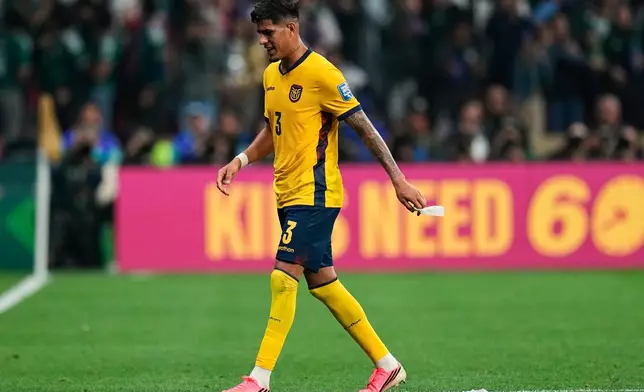 Ecuador's Piero Hincapie leaves the pitch after receiving a red card during the World Cup round of 32 soccer match against Mexico in Mexico City, Tuesday, June 30, 2026. (AP Photo/Ricardo Mazalan)